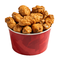 Delicious crispy fried chicken in a red bucket.