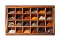 Wooden spice box with various spices.