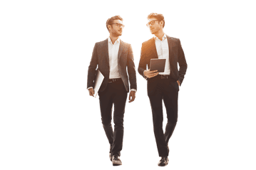 Two businessmen walking together, discussing work.