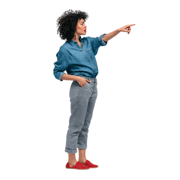 Confident woman pointing, isolated on black.