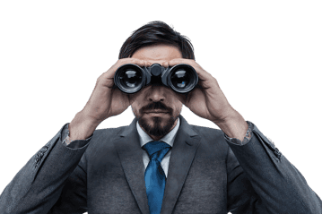 Businessman looking through binoculars, searching for opportunities.
