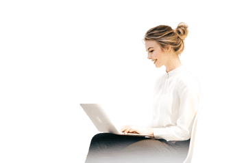 Smiling businesswoman using laptop computer.