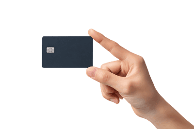 Close up of a hand gesturing towards a black credit card.