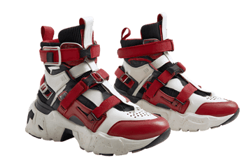 Stylish red and white high top sneakers isolated on black.