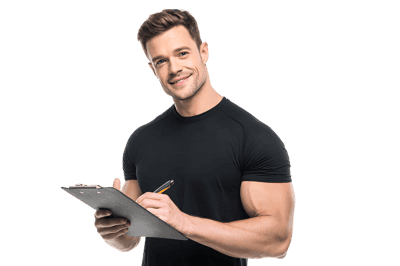 Smiling fitness trainer writing on clipboard