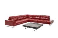 Luxury red leather sectional sofa with coffee table. Modern furniture interior design.