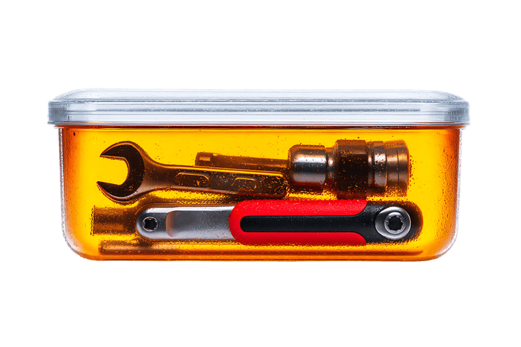 Tools in a transparent container. Repair, maintenance, DIY concept.