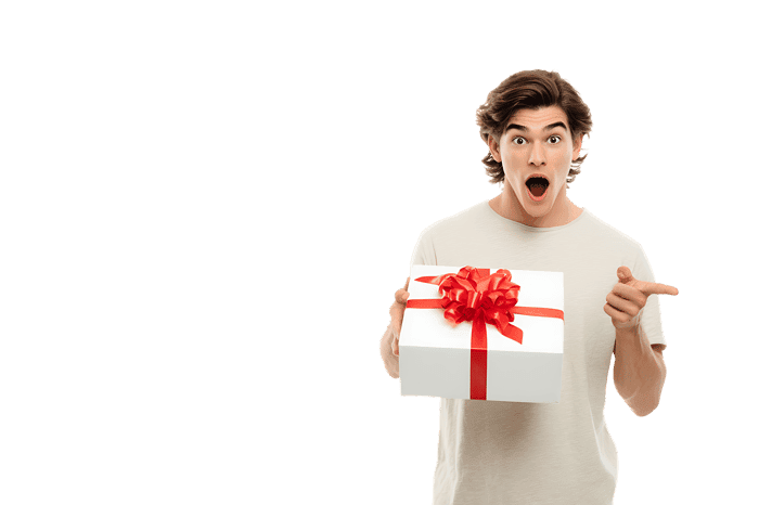 Surprised man holding a gift, pointing to the side.