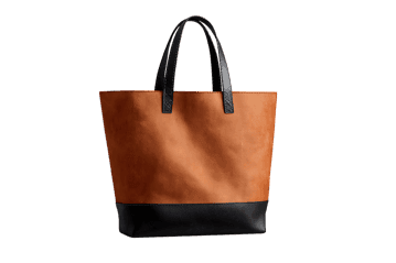 Stylish brown and black tote bag isolated on black background